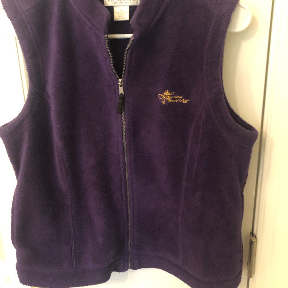ECU Purple Vest w/Yellow ECU Logo. Size Medium